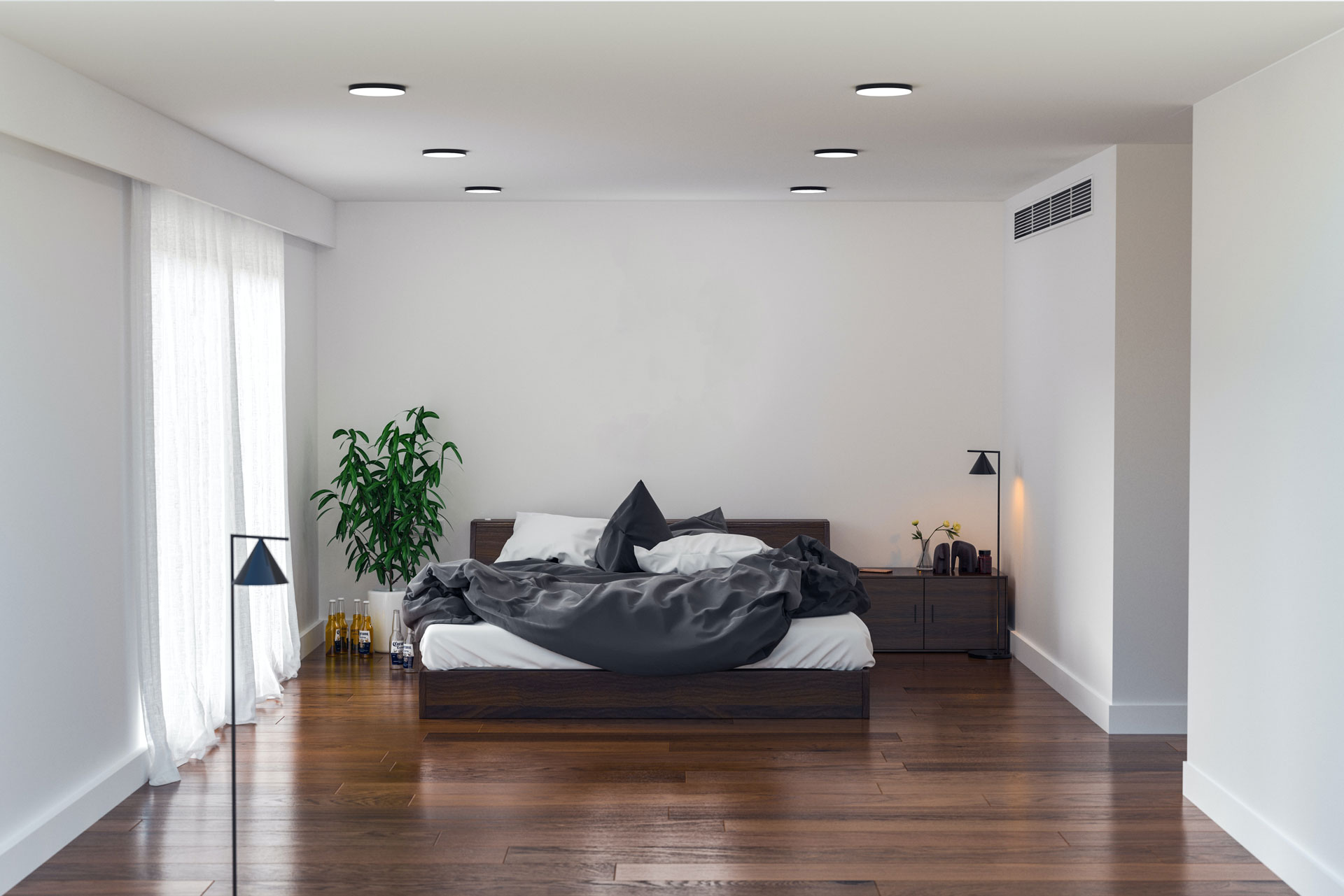 Dark wood flooring in bedroom with platform bed