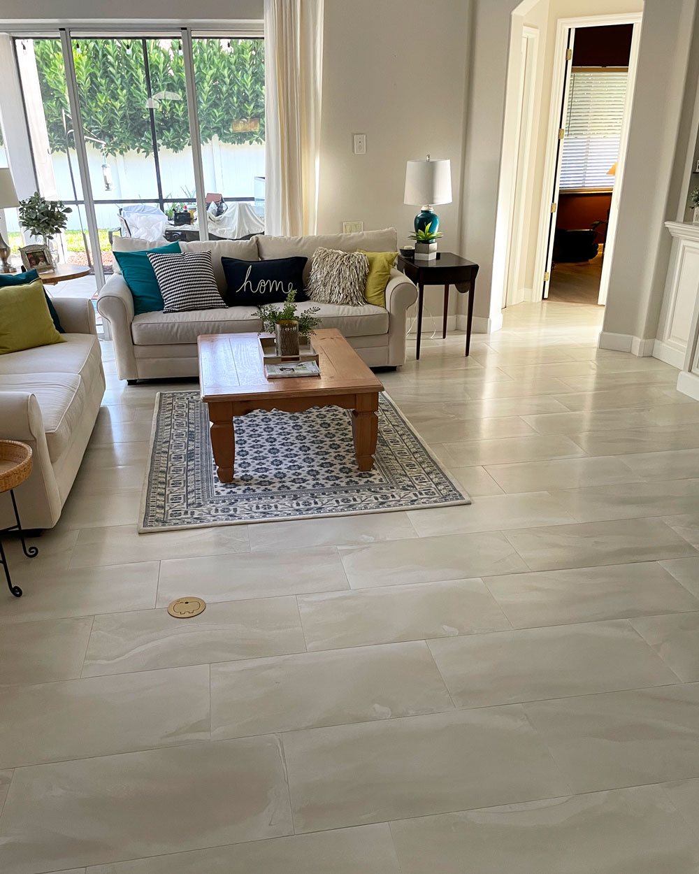 Living room with white and grey tile planks