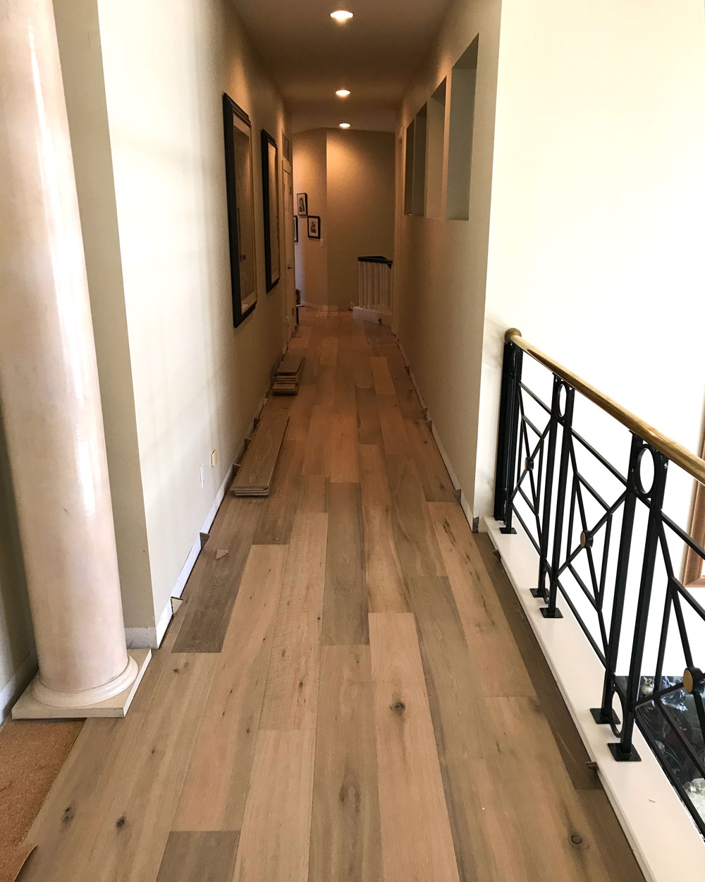 Elegant hallway with natural hardwood flooring