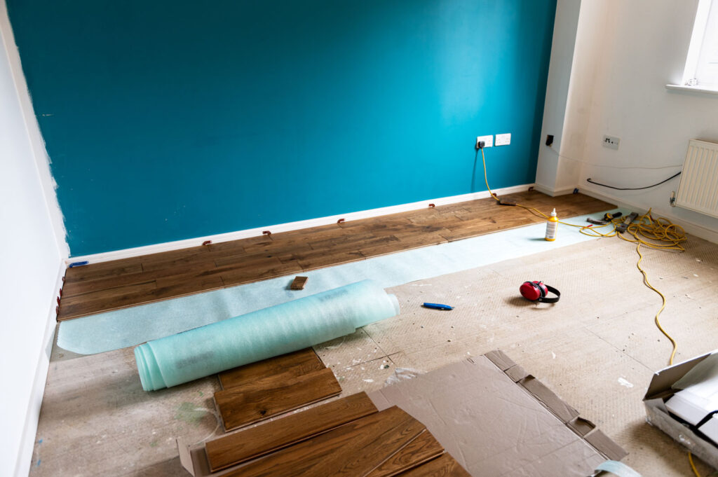Solid oak wood flooring being installed