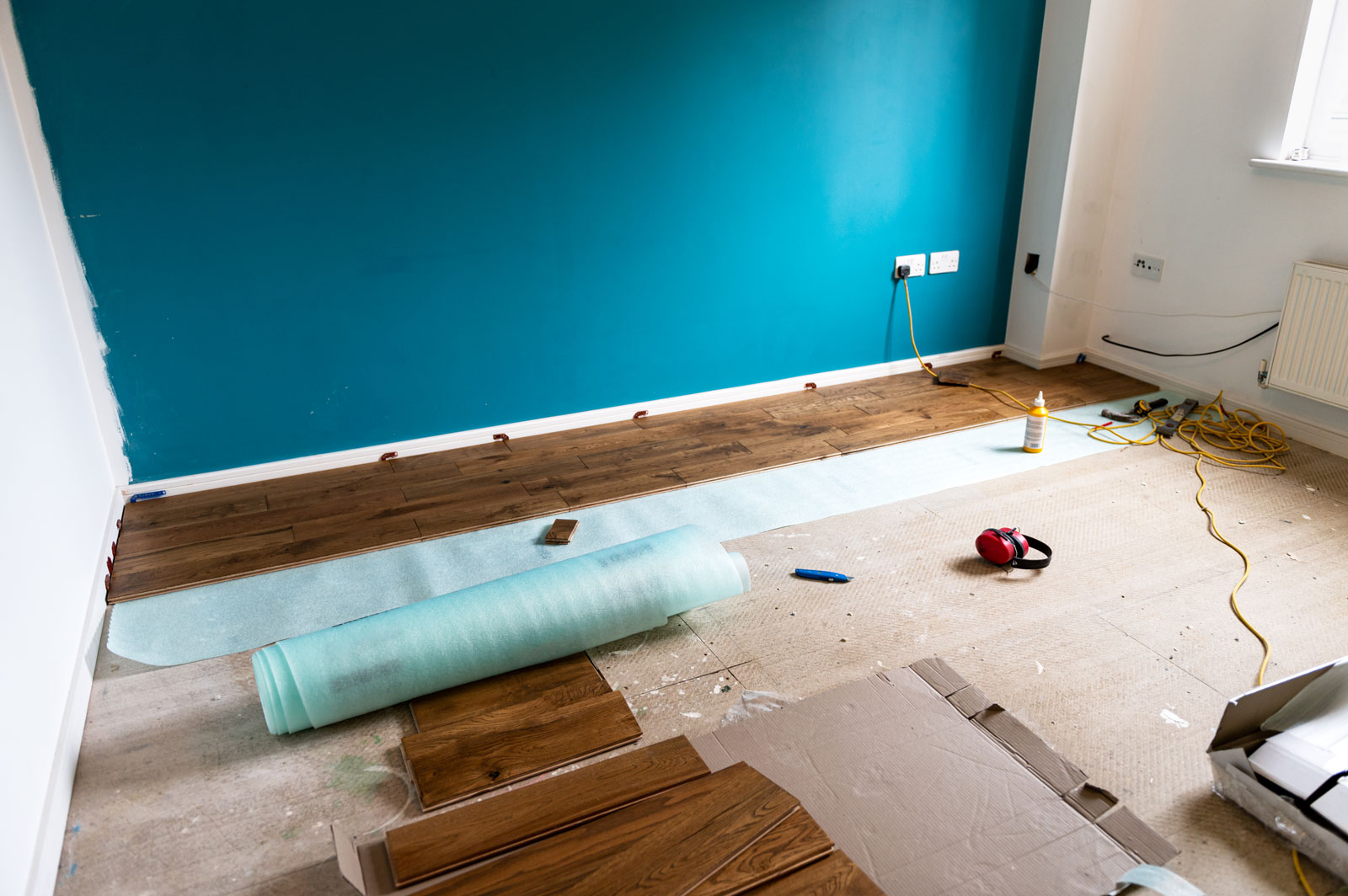 Solid oak wood flooring being installed